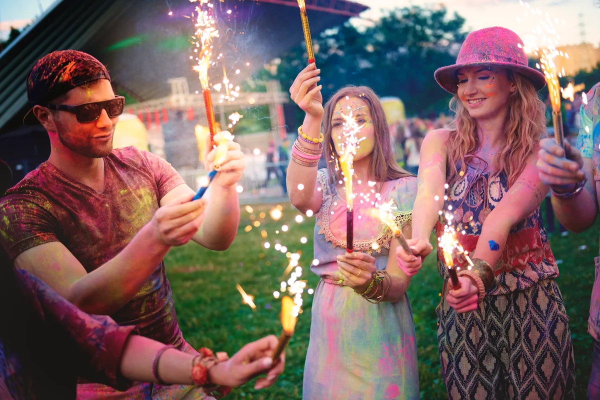 friends lighting fireworks