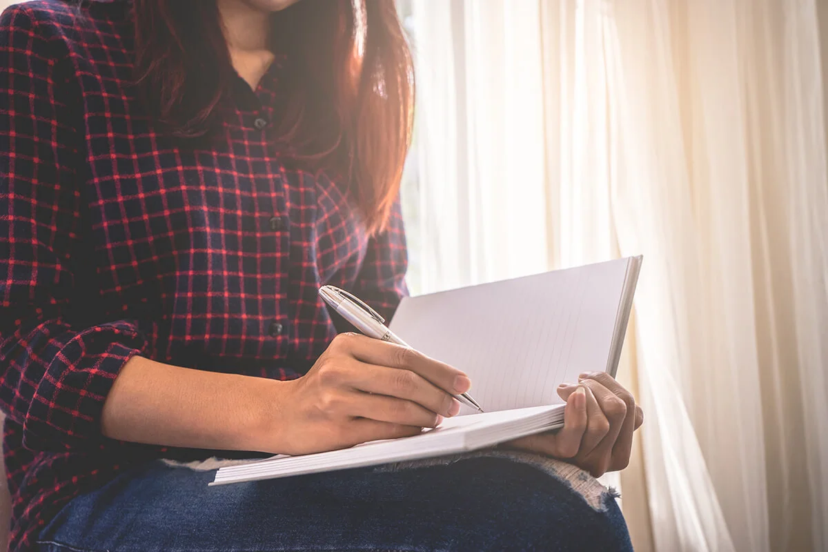 Woman writing a letter