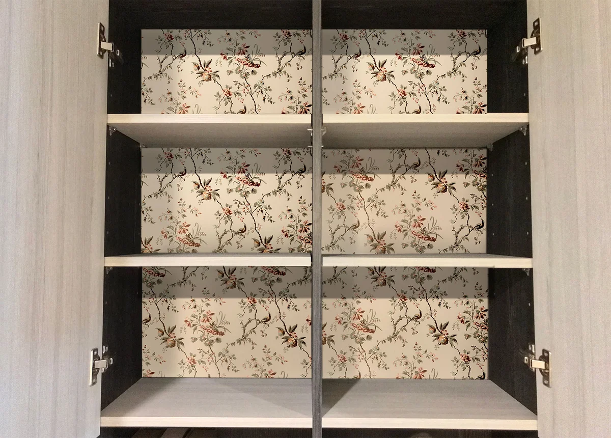 Patterned paper lining inside cabinet wall