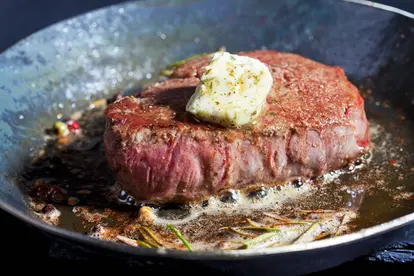steak in cast iron skillet