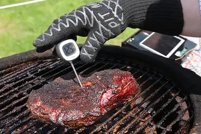 checking temp with thermometer
