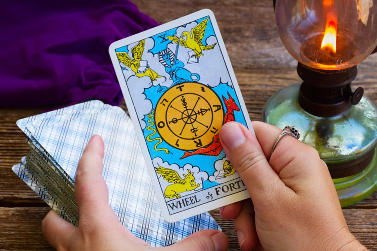 Wheel of fortune tarot card in deck / ID 74409823 © Neirfy