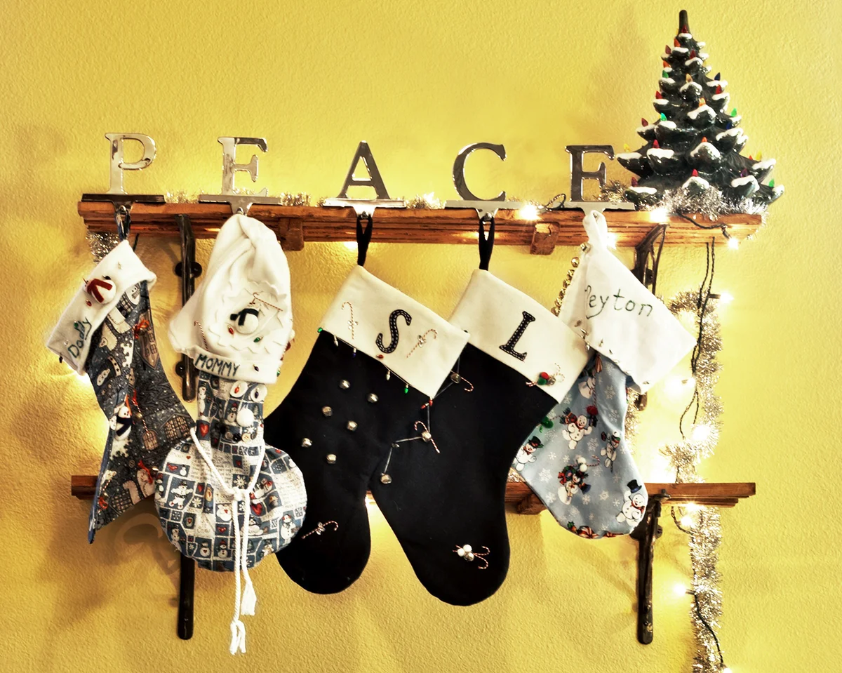 Christmas stockings hanging from shelves