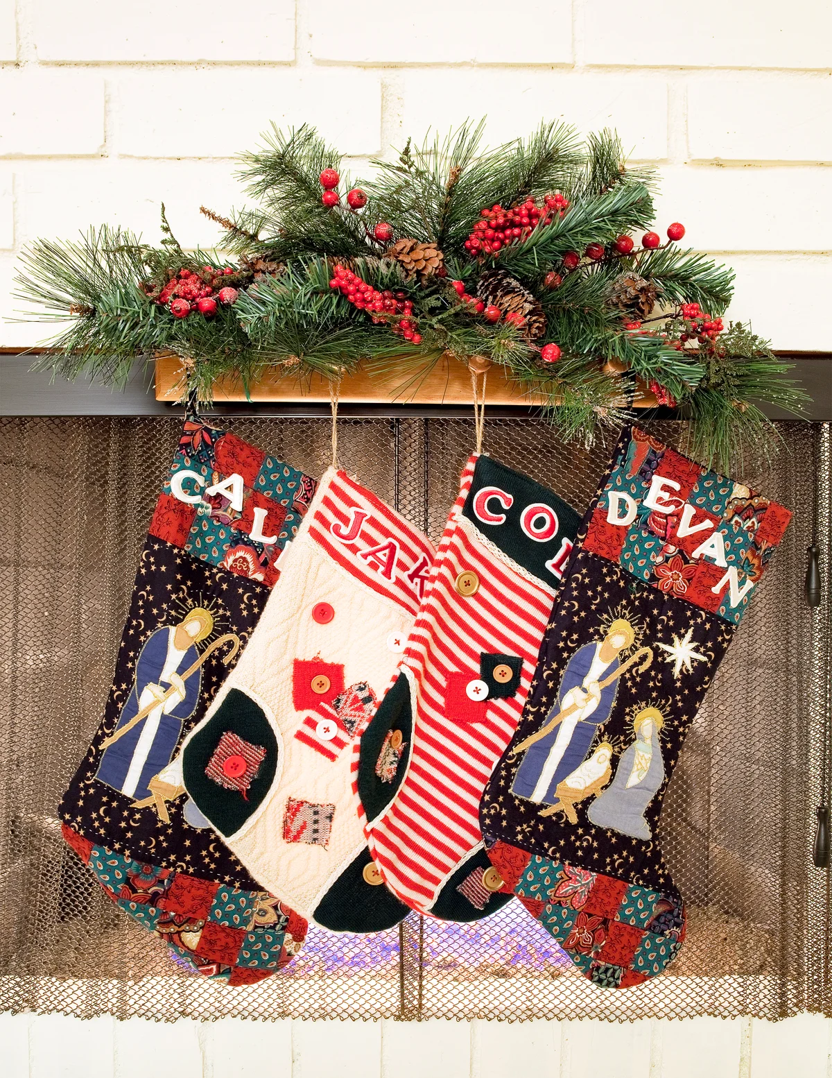 Christmas stockings hanging on fireplace