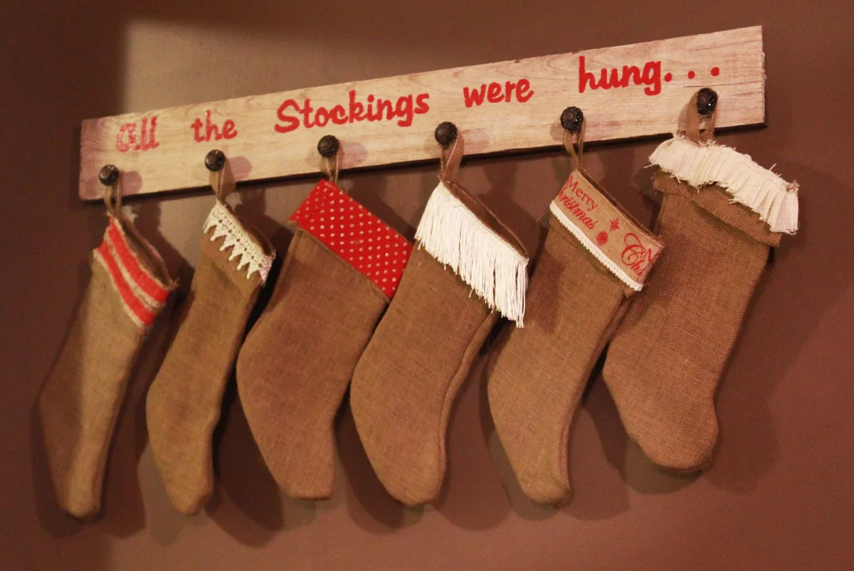 Christmas Stockings Hanging Against Wall