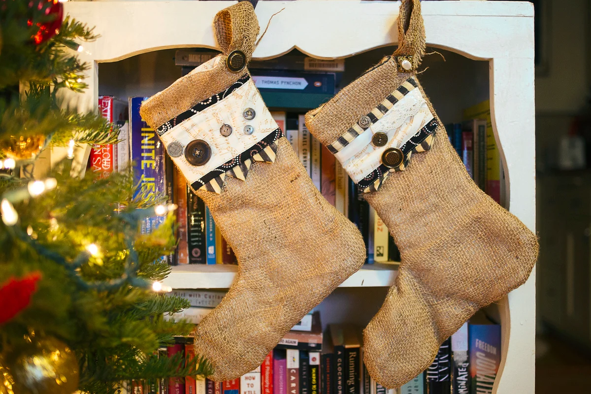 Stockings hanging on bookcase