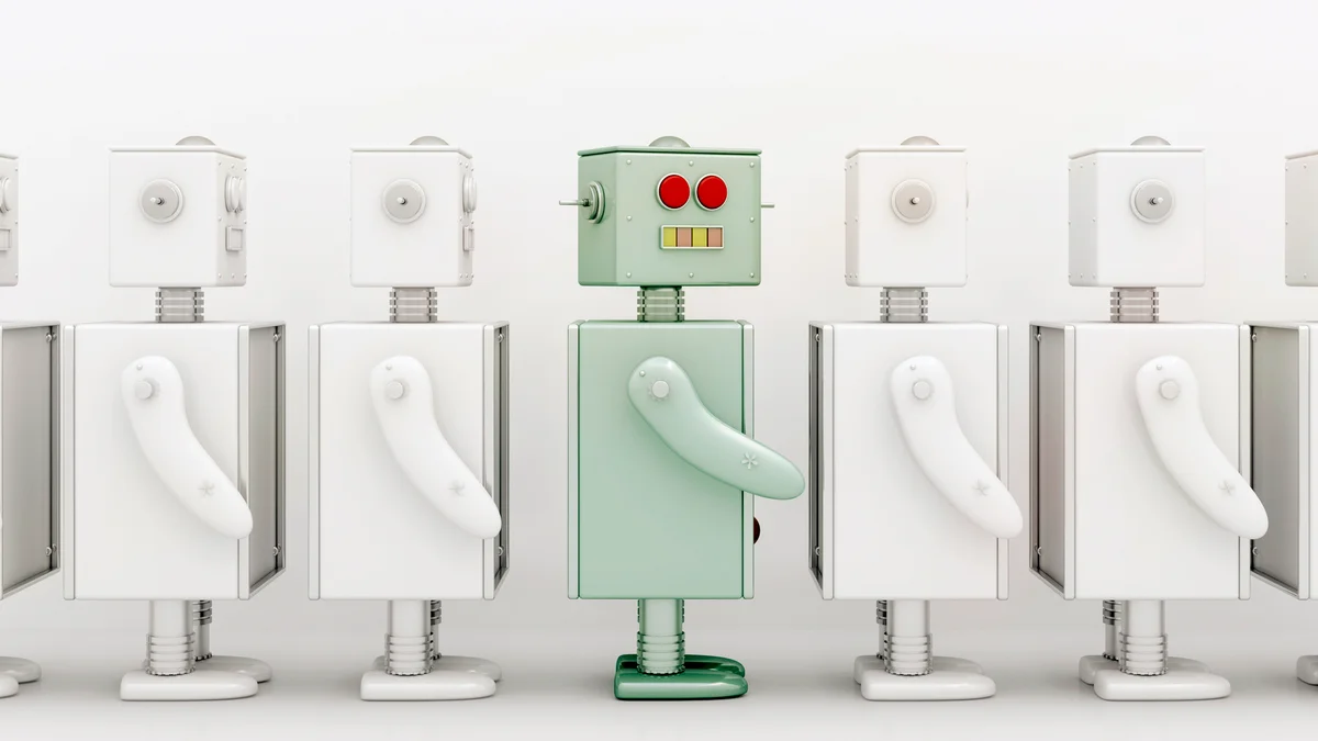Row of white robots with a coloured one in between
