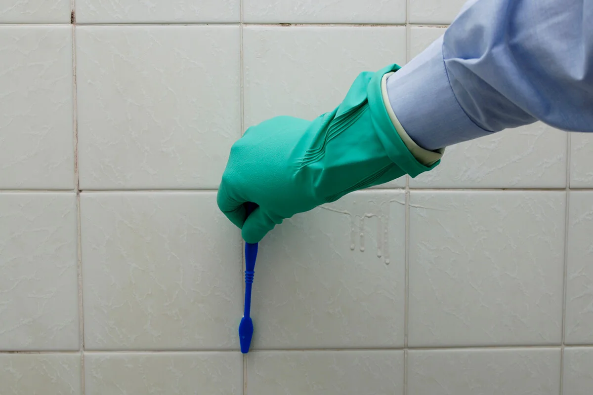cleaning the bathroom, Tooth brush scrubbing grungy