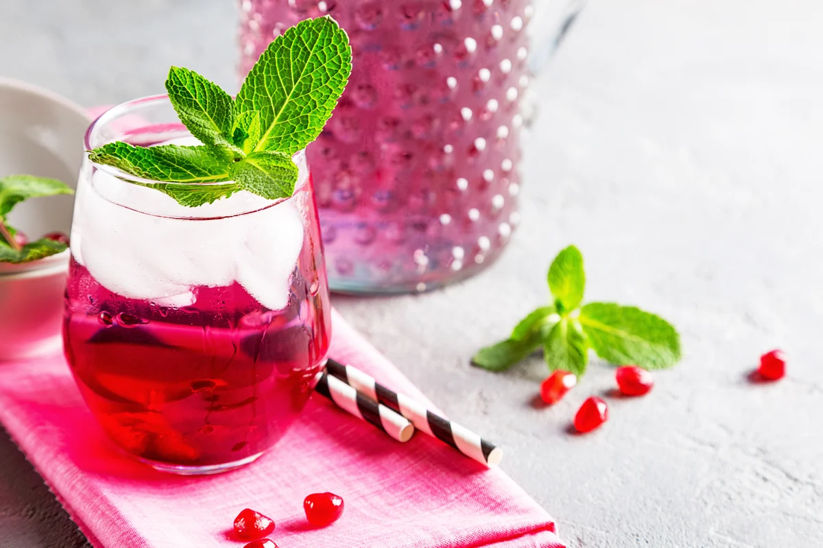 Hot pink ice cold drinks with pomegranate