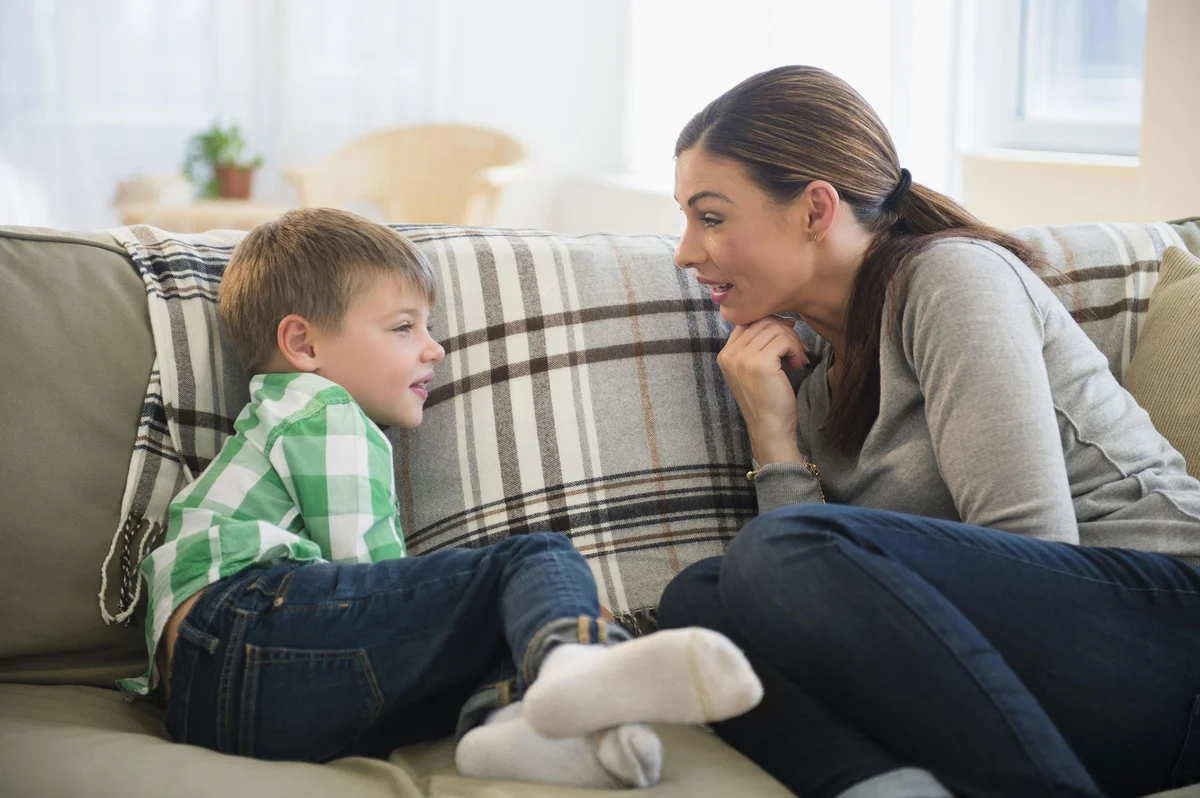 Mother and son talking