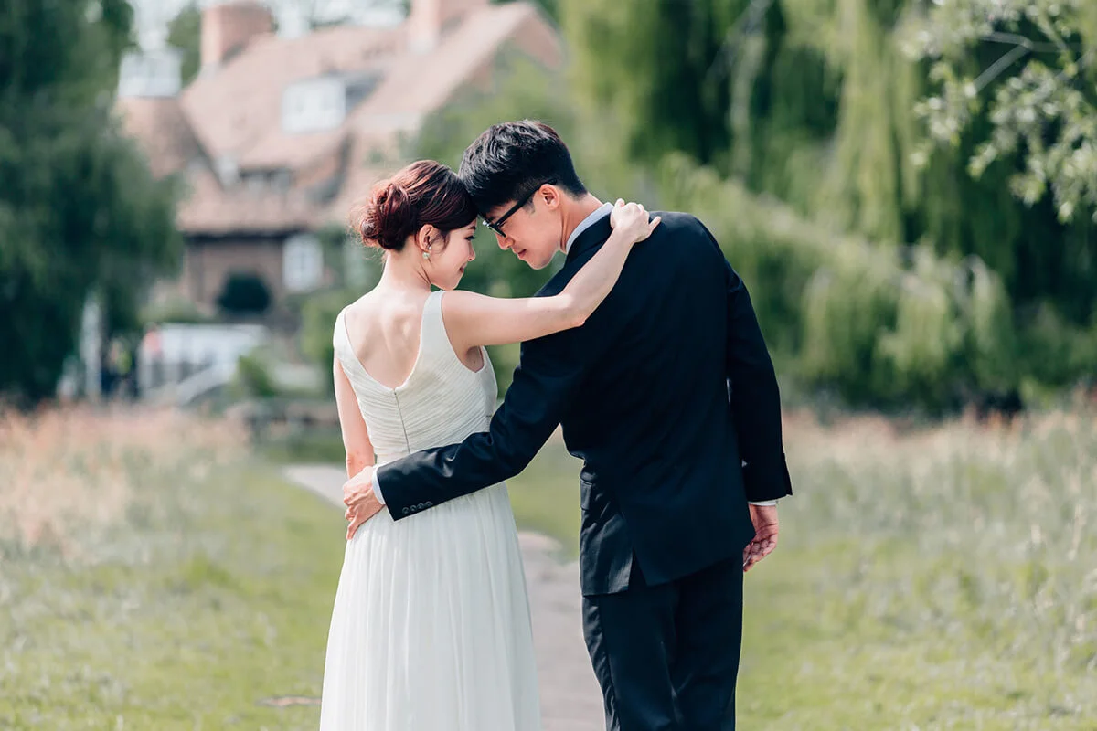 Young couple walking in garden