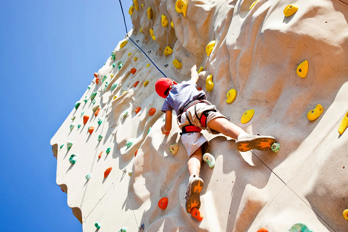 Boy on climbing wall