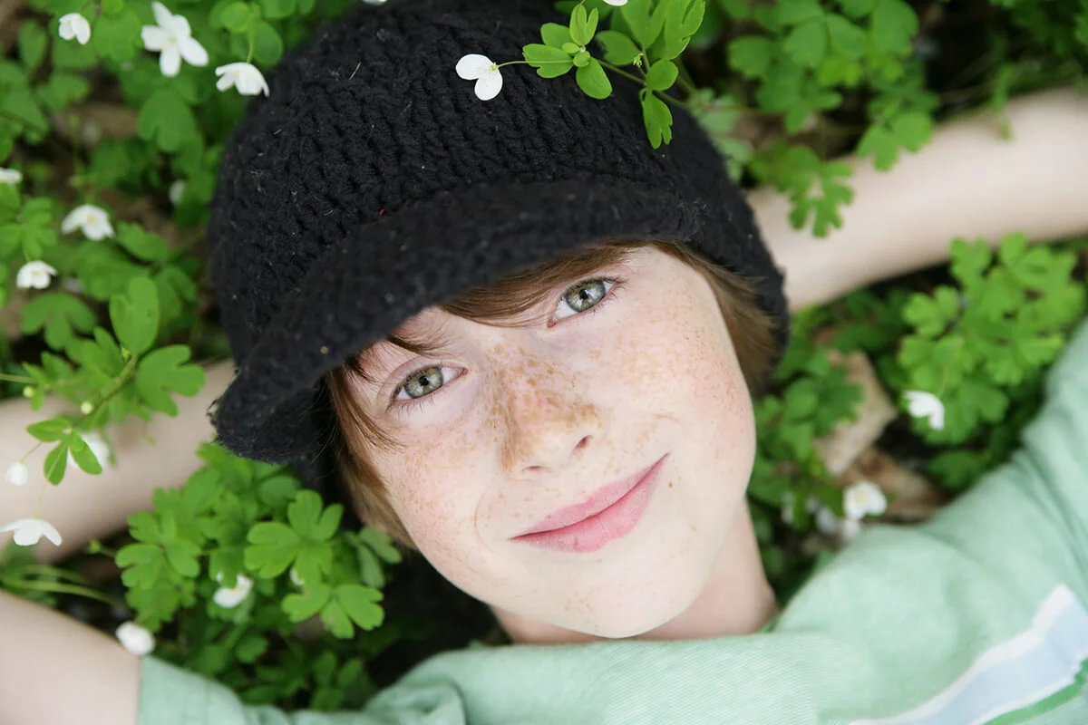 Boy Resting in Wildflowers