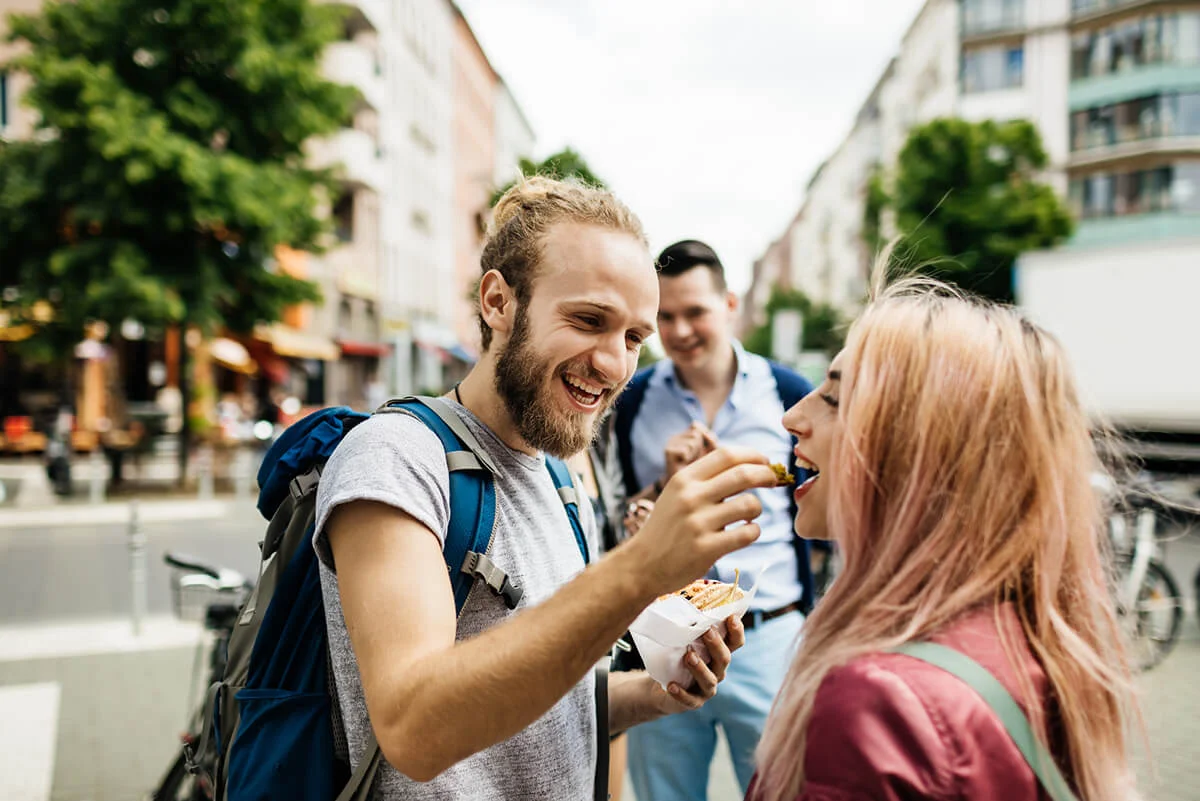 Young Couple Enjoy A Snack Together