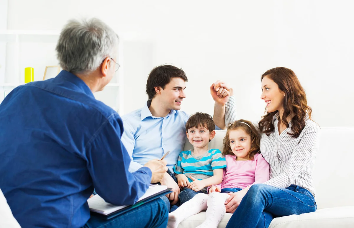 Family talking to therapist