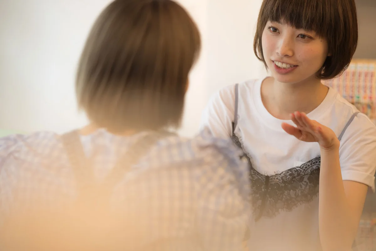 Woman giving advice to another