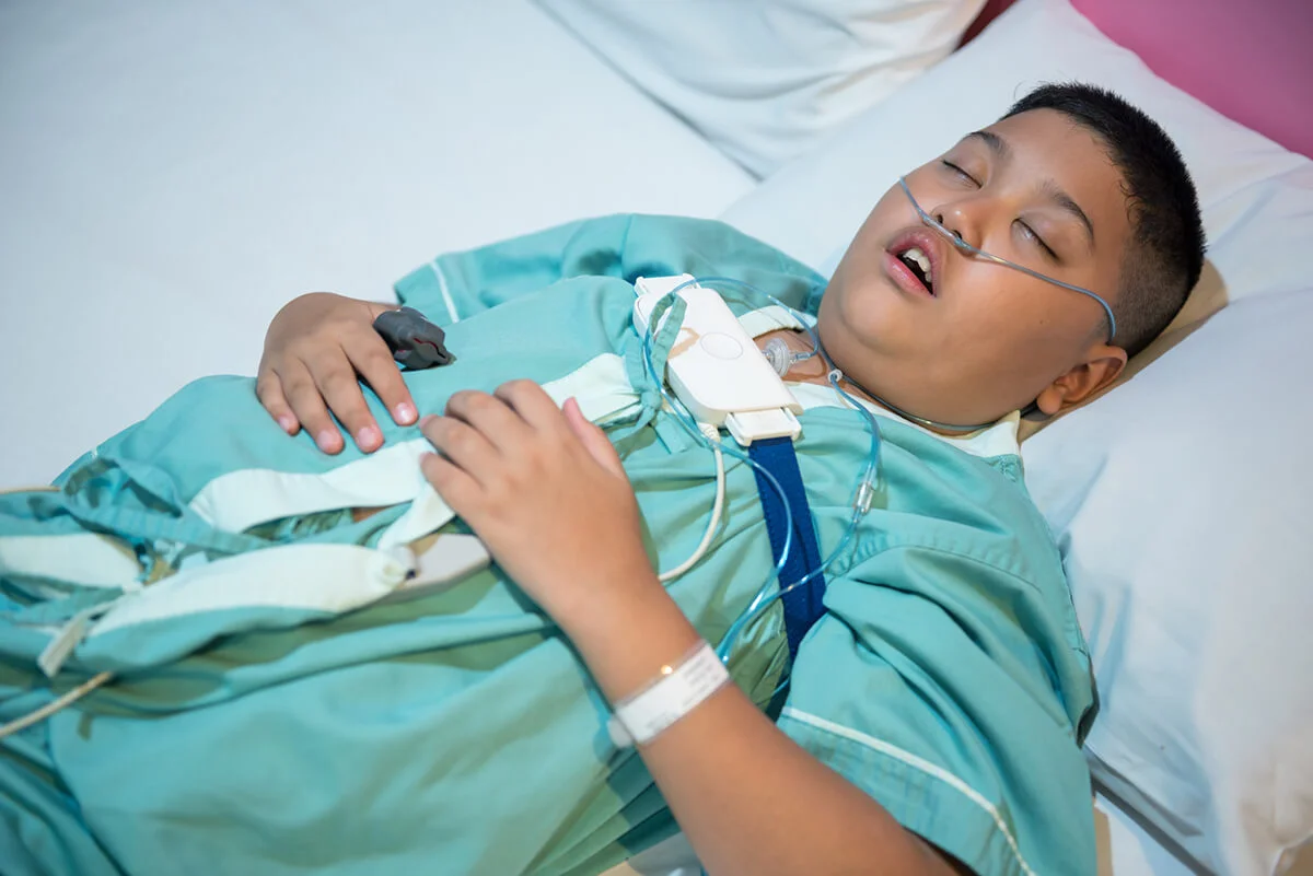 Boy in hospital wearing Sleep Apnea Diagnostic