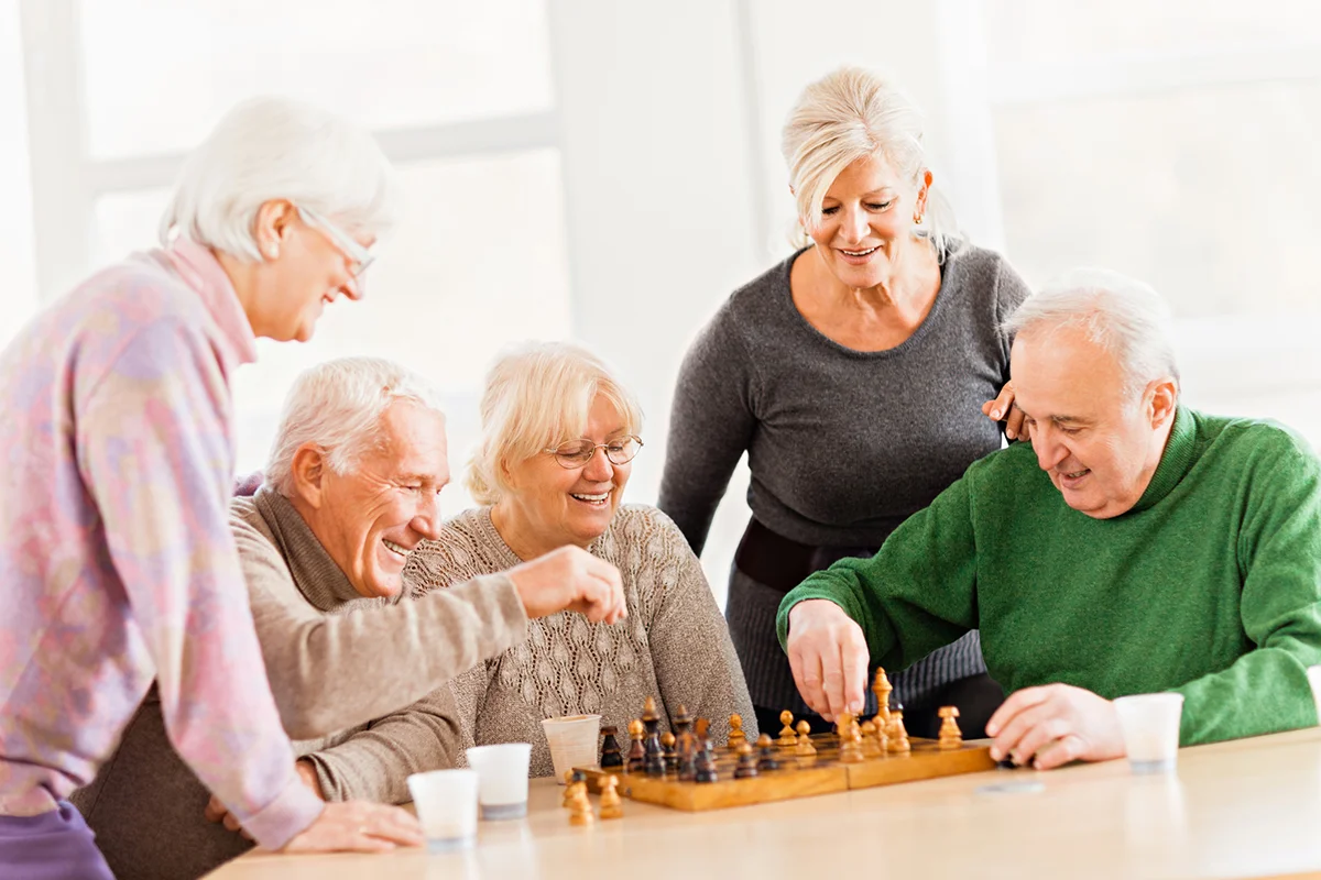 Senior people playing chess