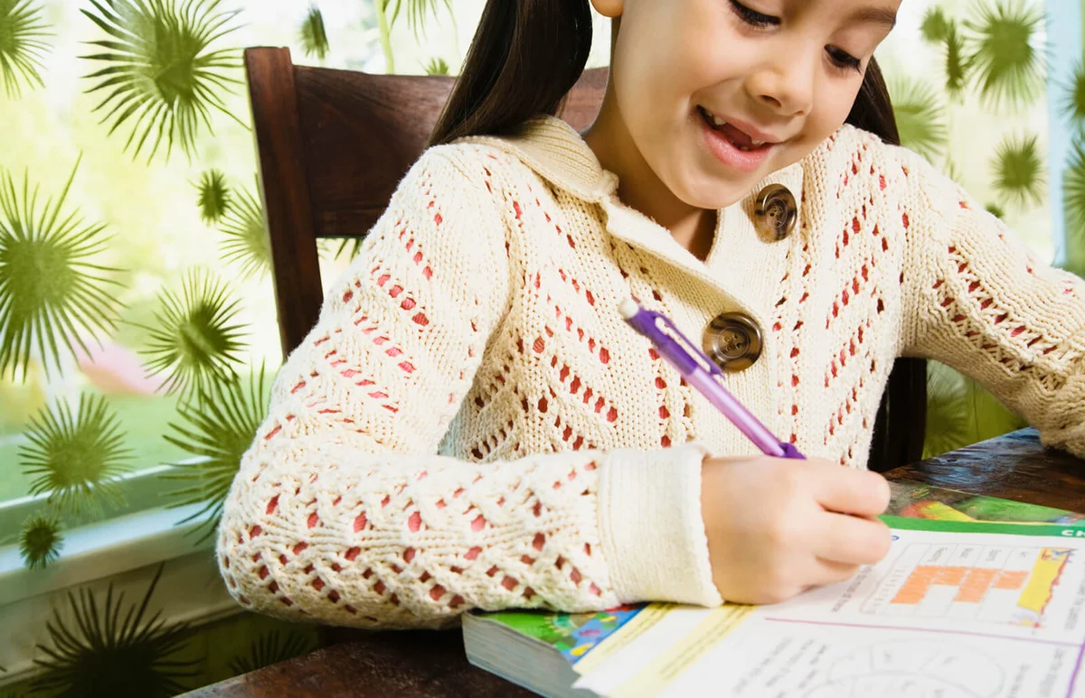 girl working on a word puzzle