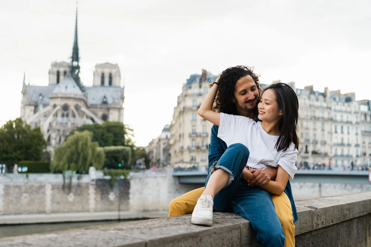 Happy couple in Paris on Seine river