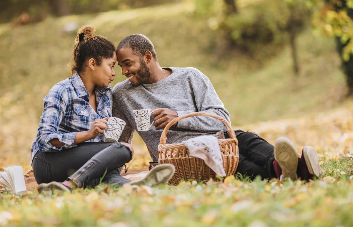 couple enjoying in their love on a picnic at the park