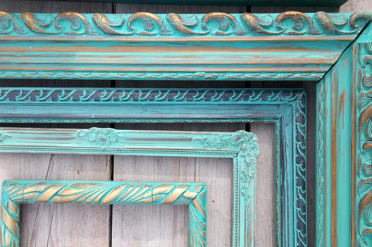 Ornate green stained wood frames