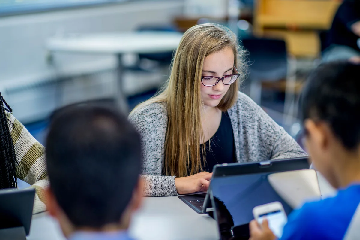 Girl working on computer laptop