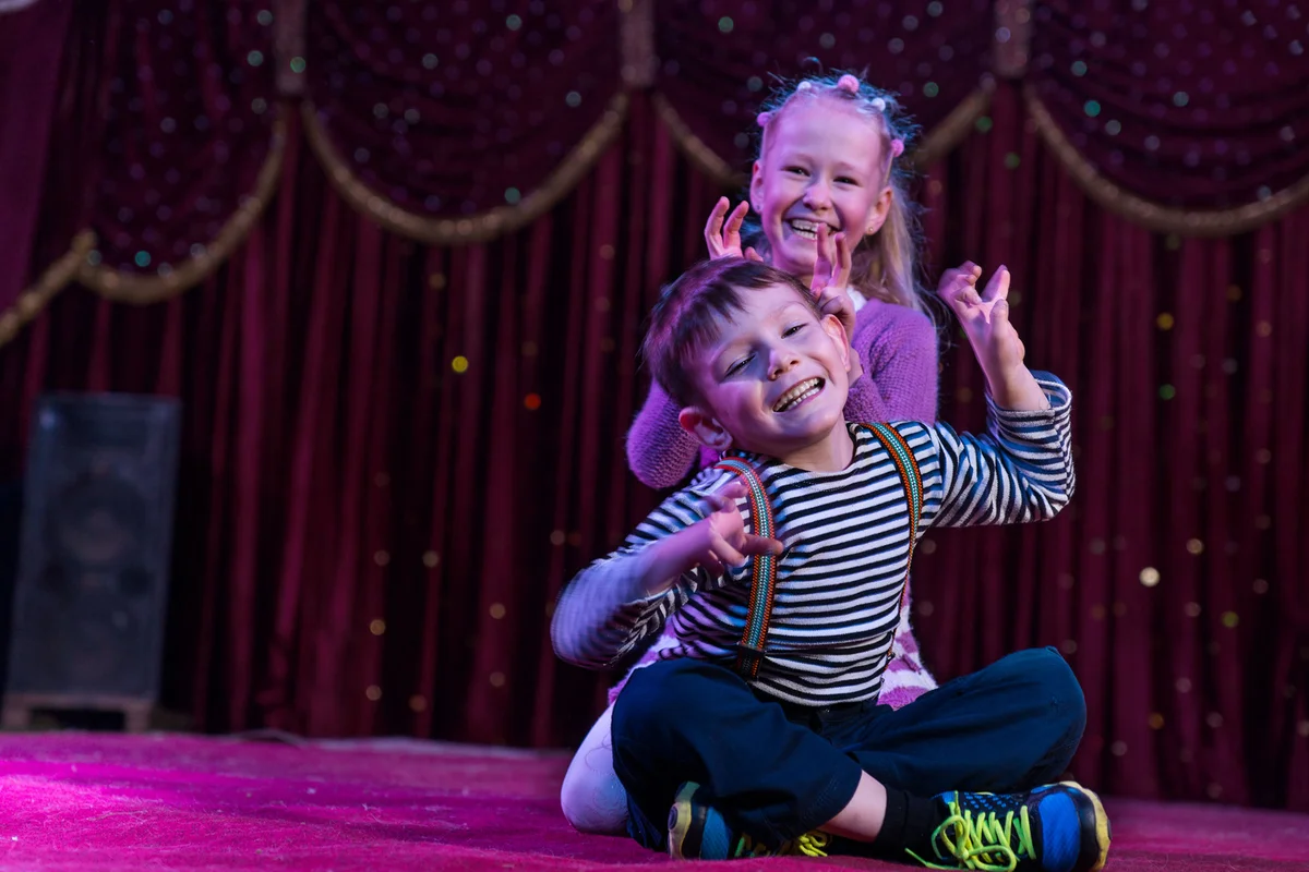 Kids performing on stage