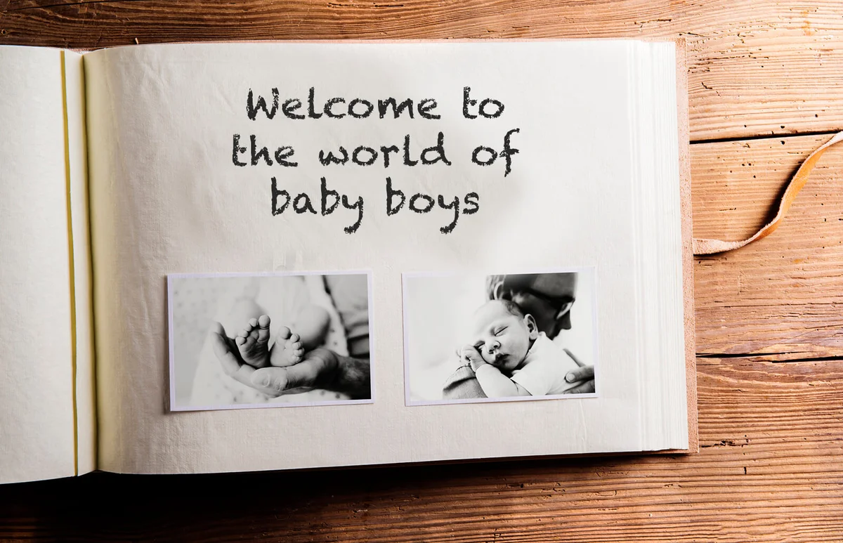 Photo album with pictures of father and baby son