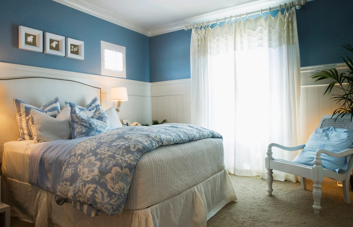 Cozy Blue Bedroom with Flower Linens