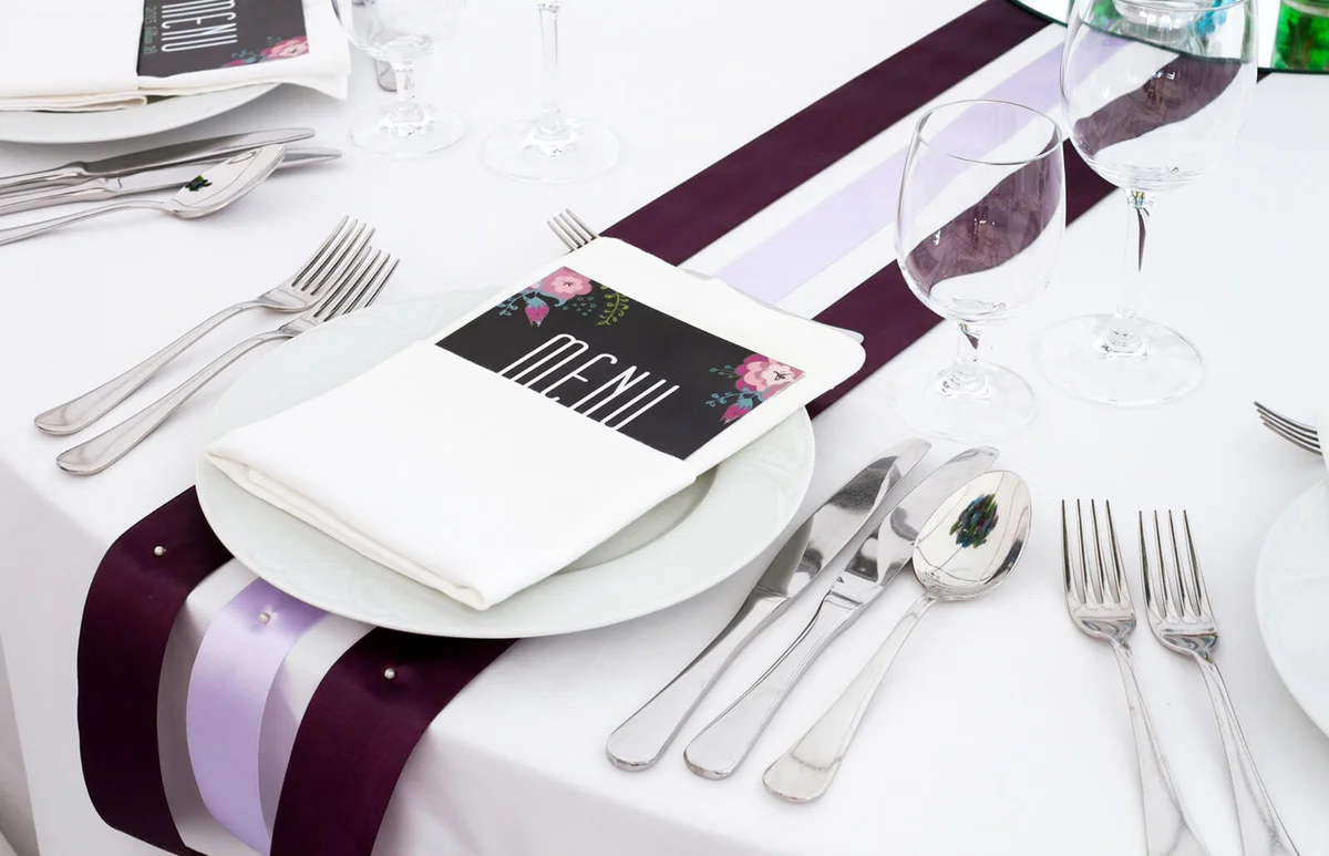 wedding table with purple decoration