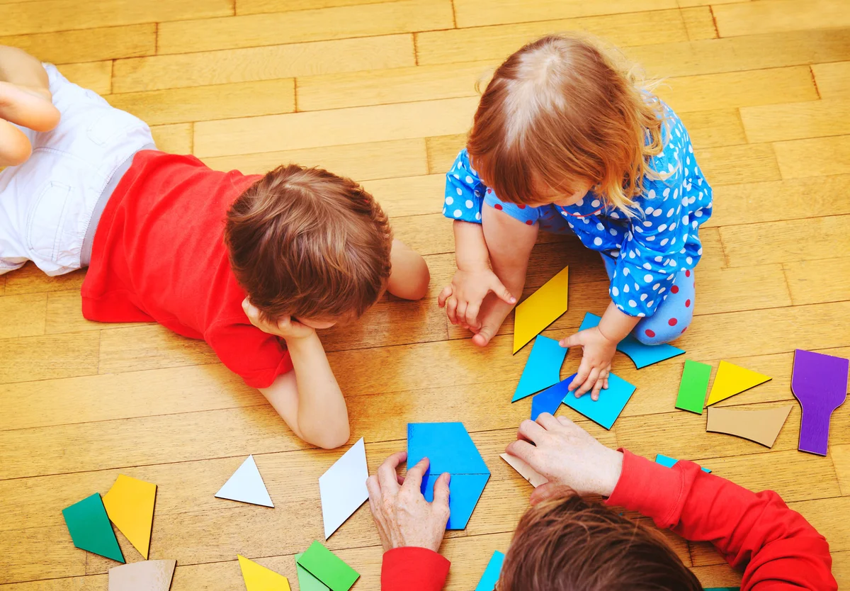 Kids playing with shapes