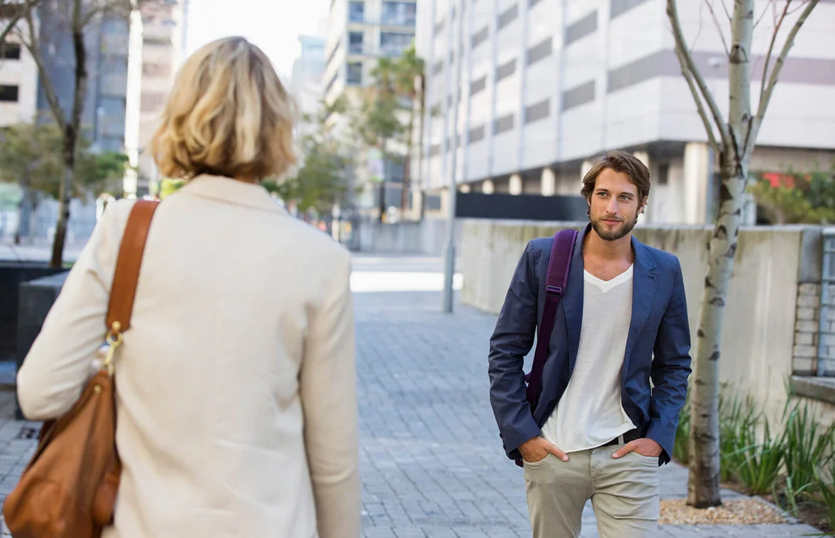 Man and woman walking on a street