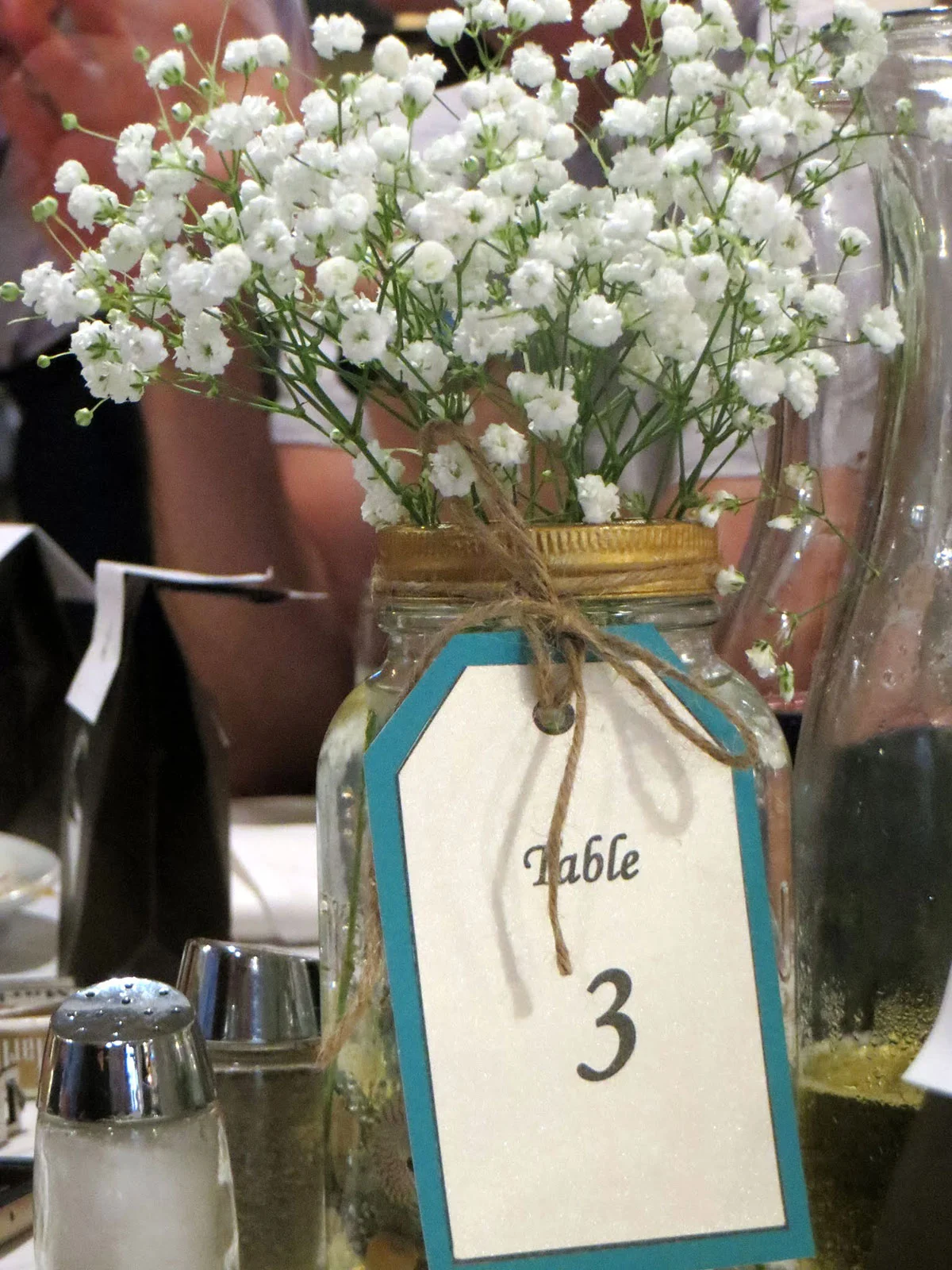White baby's breath flowers in jar