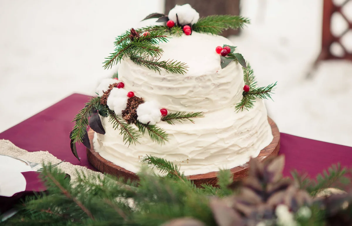 Cake With Twigs And Fruits On Table