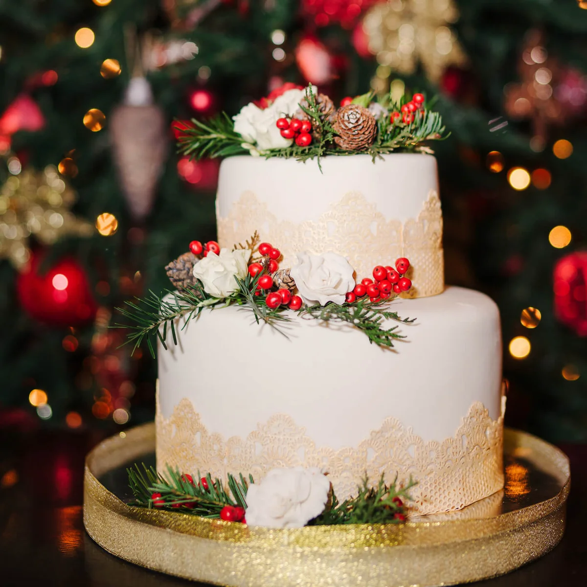 Wedding cake on the background of Christmas tree