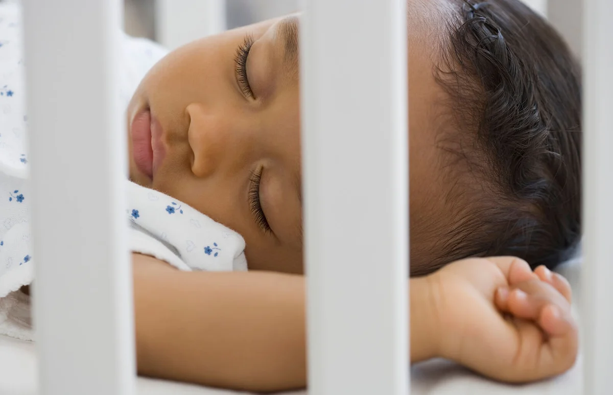 Baby sleeping in crib
