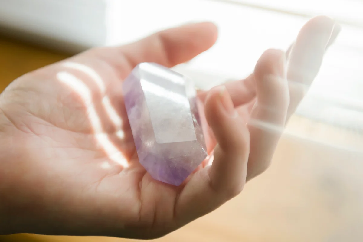 woman holding crystal