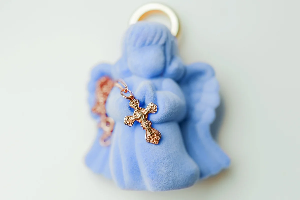 Golden cross for christening
