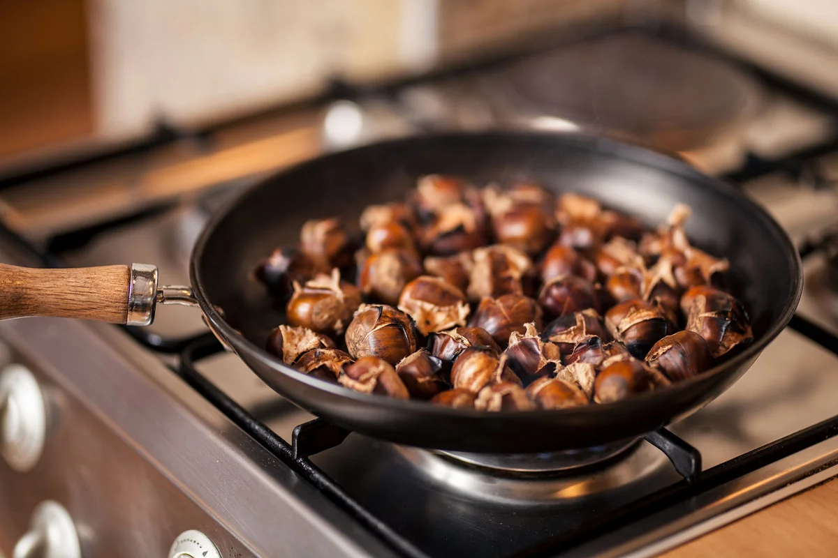 Roasting chestnuts in pan