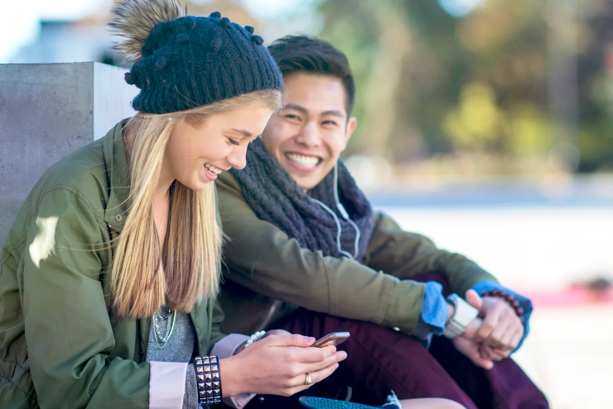 Couple Laughing Together Outside