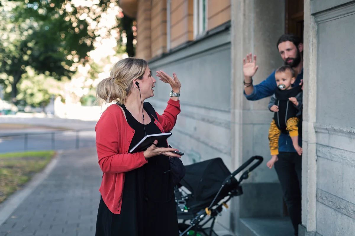 Career mom waving good-bye
