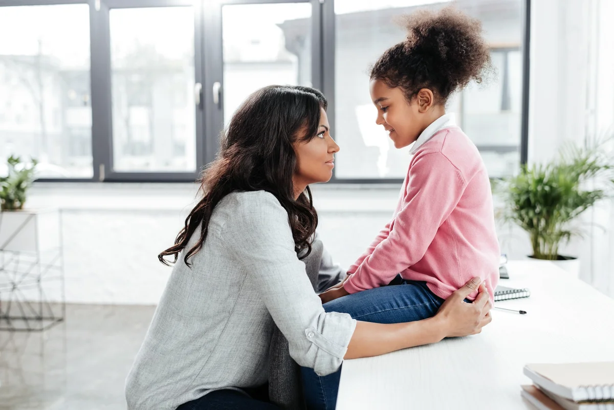 mother and daughter talking