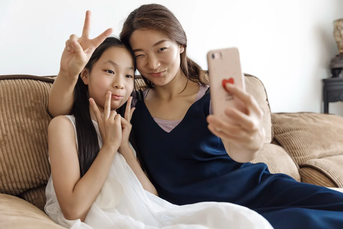 mom and daughter being silly