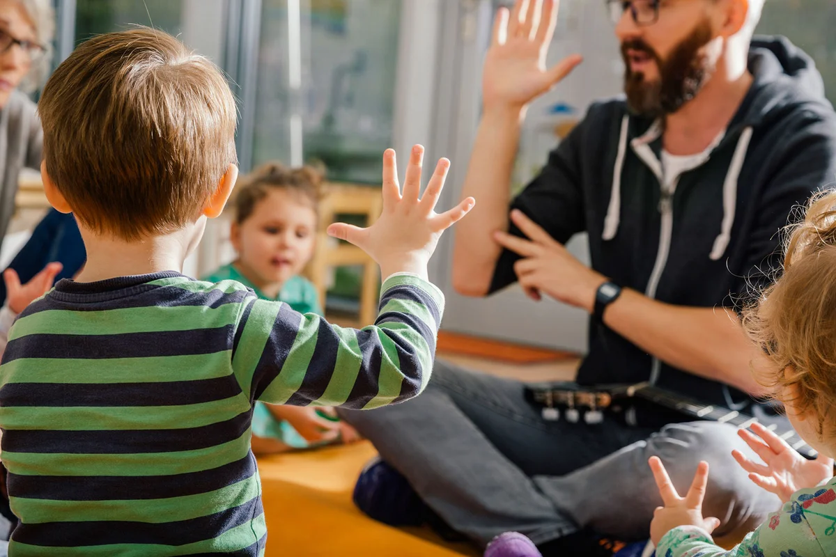 Child raising hands up