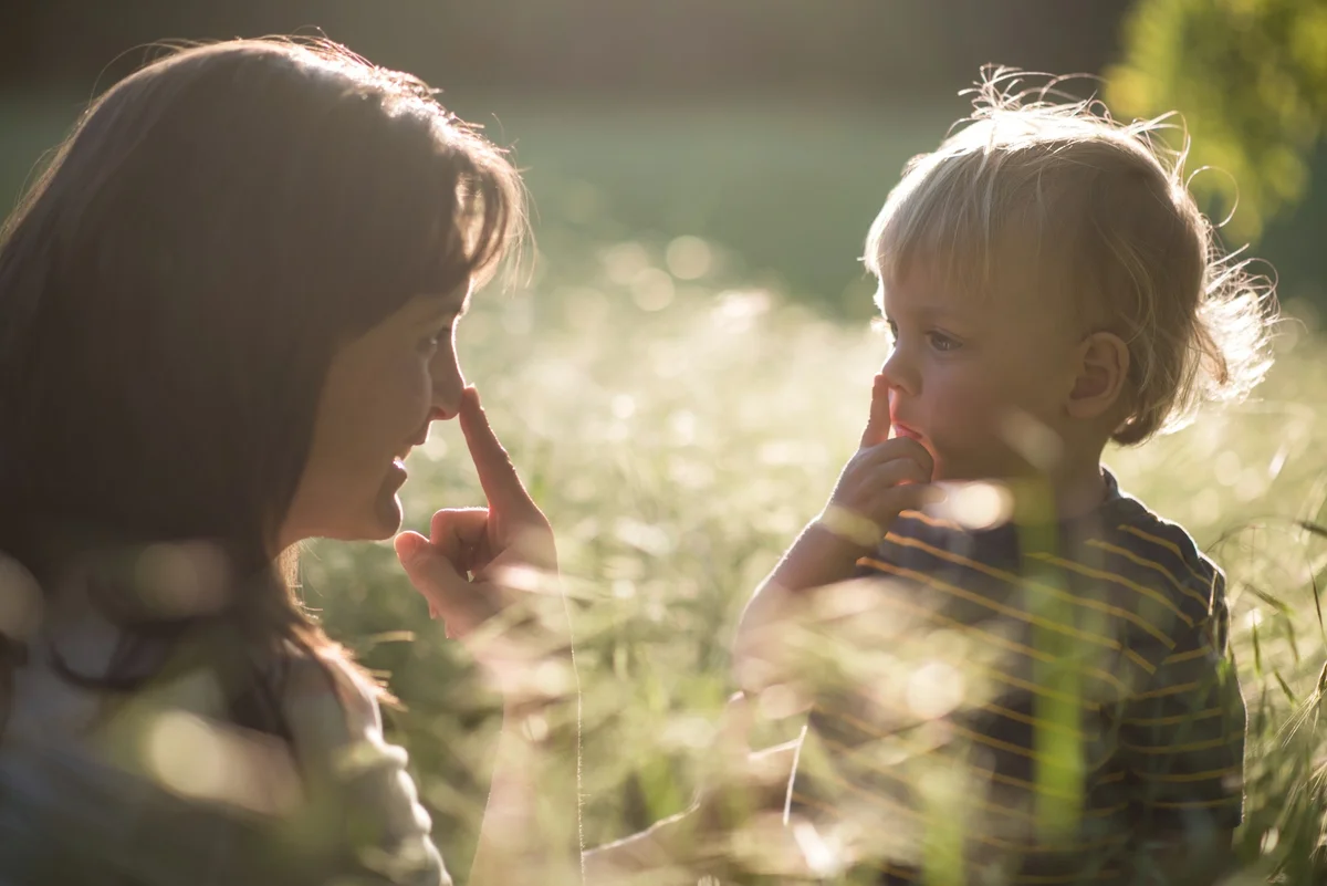 child imitating mom