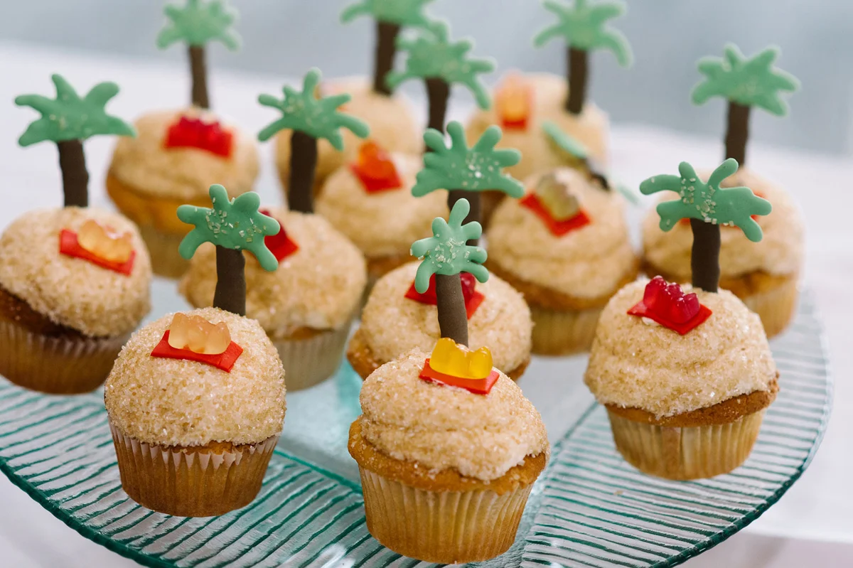 Palm tree beach cupcakes on plate