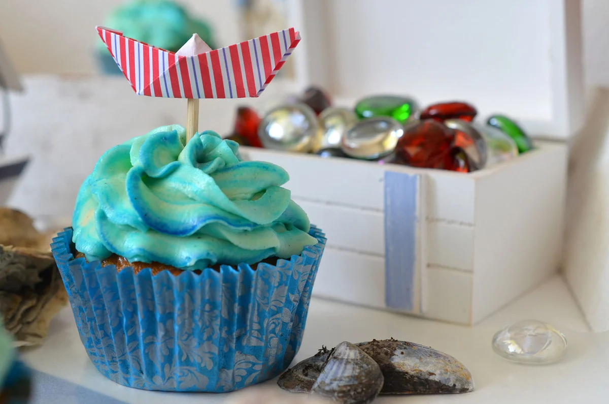 Blue cupcake with boat