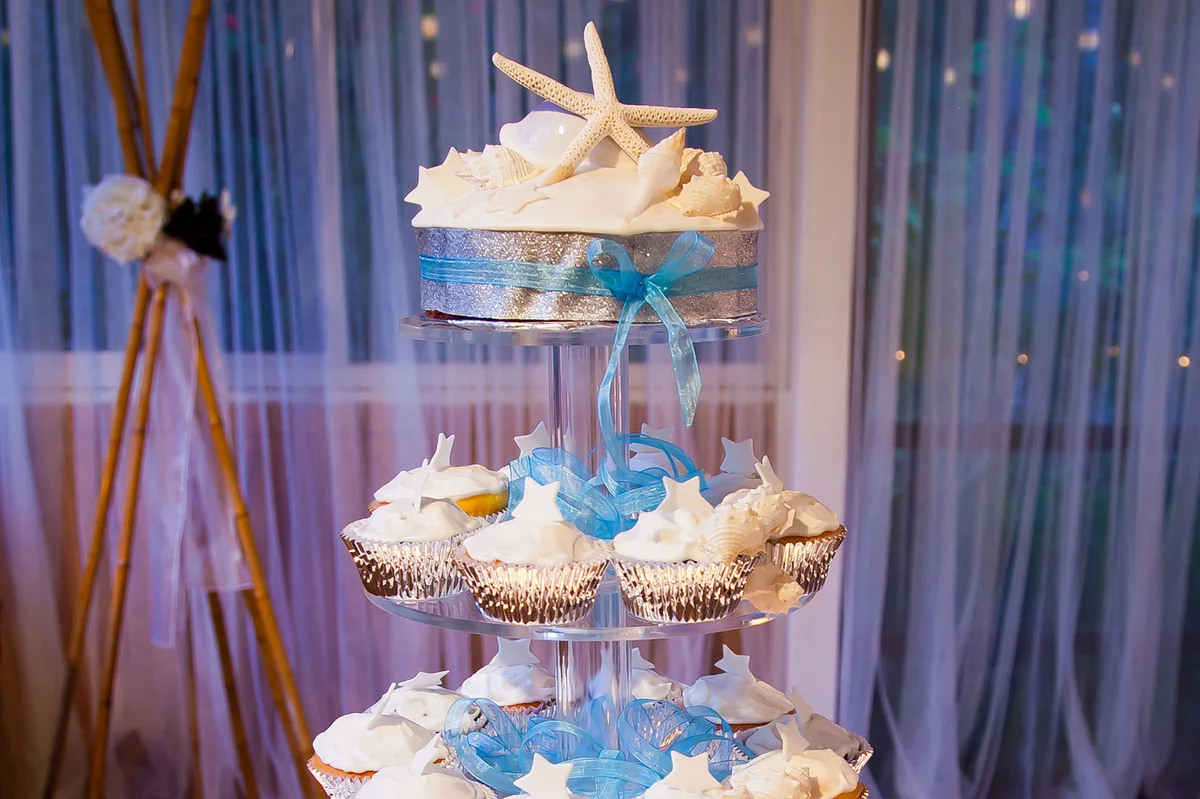 Starfish cupcake display at wedding reception