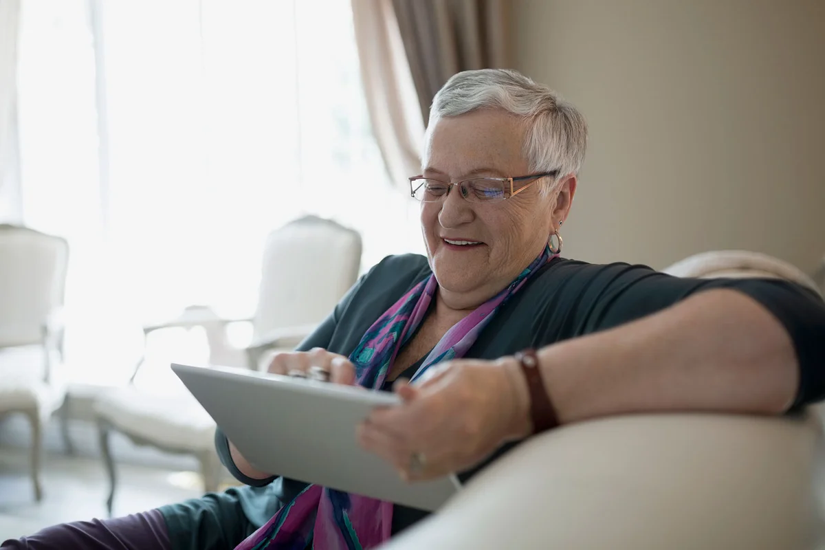 Senior woman playing mind games online